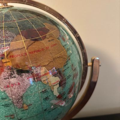 LOT 84: Gold Brass Tabletop World Globe w/Gemstone Inlay, World Globe w/ Inlay Gemstone Paperweight & Miksa Picture Frame