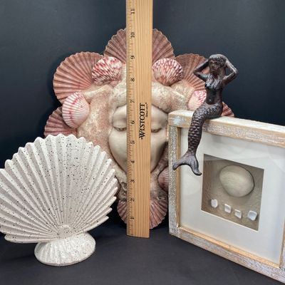 LOT 69: Mermaid / Beach Collection - Art Pottery Mask Sculpture w/Seashells, Cast Iron Mermaid, Scalloped Shell Sculpture & More