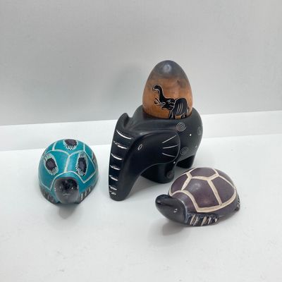 LOT 64: Collection of Carved Animals (Onyx, Wood, Stone) with Ceramic Folk Art Candlestick Holder