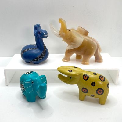 LOT 64: Collection of Carved Animals (Onyx, Wood, Stone) with Ceramic Folk Art Candlestick Holder