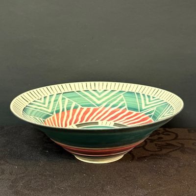 LOT 50: Colorful Collection Of Signed Studio Art Pottery Plates Including a Fish, Check, Swirl and Other Patterns