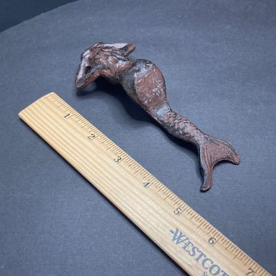 LOT 69: Mermaid / Beach Collection - Art Pottery Mask Sculpture w/Seashells, Cast Iron Mermaid, Scalloped Shell Sculpture & More