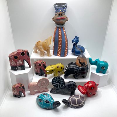 LOT 64: Collection of Carved Animals (Onyx, Wood, Stone) with Ceramic Folk Art Candlestick Holder