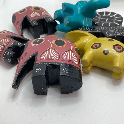 LOT 64: Collection of Carved Animals (Onyx, Wood, Stone) with Ceramic Folk Art Candlestick Holder