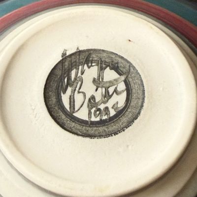 LOT 50: Colorful Collection Of Signed Studio Art Pottery Plates Including a Fish, Check, Swirl and Other Patterns