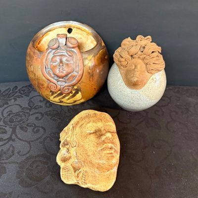 LOT 41: Trio of Studio Pottery Pieces Feating Faces - 2 Wall Pockets and a Lidded Jar