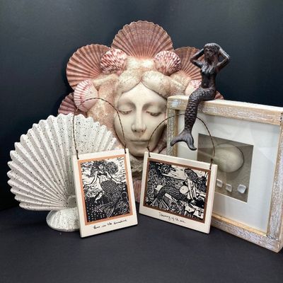 LOT 69: Mermaid / Beach Collection - Art Pottery Mask Sculpture w/Seashells, Cast Iron Mermaid, Scalloped Shell Sculpture & More