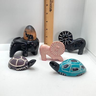 LOT 64: Collection of Carved Animals (Onyx, Wood, Stone) with Ceramic Folk Art Candlestick Holder