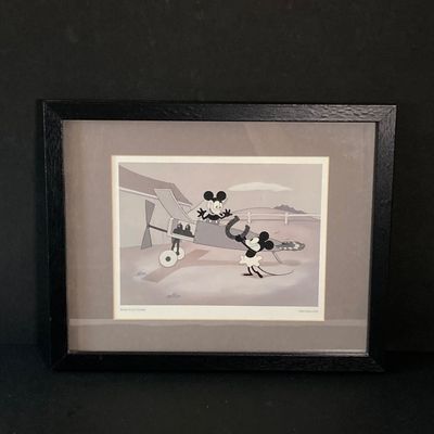 LOT 59: Framed Walt Disney Good Luck Charm / Plane Crazy 1928 Print with Souvenir Mickey Mouse and Collection of Books