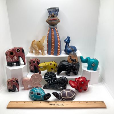 LOT 64: Collection of Carved Animals (Onyx, Wood, Stone) with Ceramic Folk Art Candlestick Holder