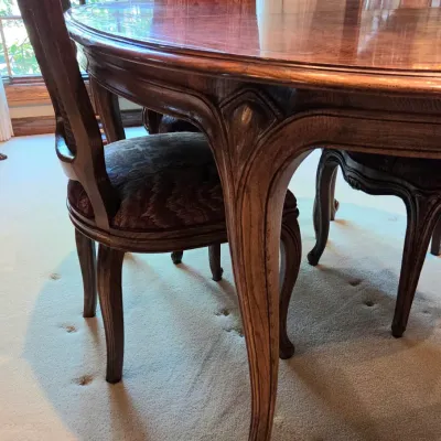 Sale Photo Thumbnail #207: Includes: 2 Leaves, 4 Side Chairs and 6 Arm Chairs
Burgundy Fabric
Table with no leaf in it: 64" long x 43" wide x 30" tall
Arm Chairs: 42" tall x 22.5" wide x 19.5" deep
Side Chairs: 42" tall x 19" wide x 18" deep
Minimal signs of wear and in very good c