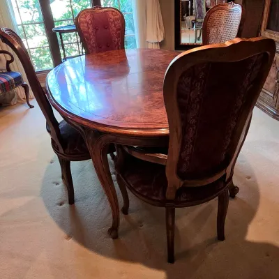 Sale Photo Thumbnail #204: Includes: 2 Leaves, 4 Side Chairs and 6 Arm Chairs
Burgundy Fabric
Table with no leaf in it: 64" long x 43" wide x 30" tall
Arm Chairs: 42" tall x 22.5" wide x 19.5" deep
Side Chairs: 42" tall x 19" wide x 18" deep
Minimal signs of wear and in very good c