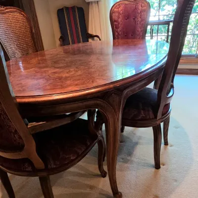 Sale Photo Thumbnail #205: Includes: 2 Leaves, 4 Side Chairs and 6 Arm Chairs
Burgundy Fabric
Table with no leaf in it: 64" long x 43" wide x 30" tall
Arm Chairs: 42" tall x 22.5" wide x 19.5" deep
Side Chairs: 42" tall x 19" wide x 18" deep
Minimal signs of wear and in very good c