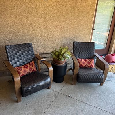 Brown Jordan Adirondack chairs featuring woven rattan backs and curved wooden arms