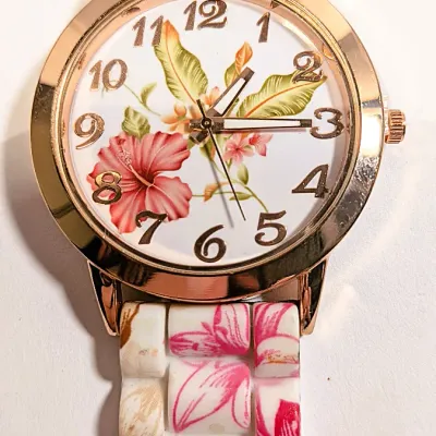 Sale Photo Thumbnail #21: PINK & GREEN FLOWER WATCH with  Luminescent Watch Hands-BAND: (9½" Rubber) DIAL: (Round, ROSE GOLD  1½" Diam.) BRAND: (Geneva) BATTERY: Button 20 mm  *EXTRA BATTERY INCL.*
ALL ITEMS SHIPPED FREE