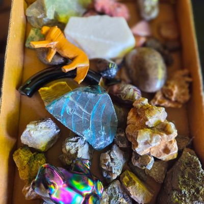 Assorted Mineral and Gemstone Collection with Carved Wooden Lion