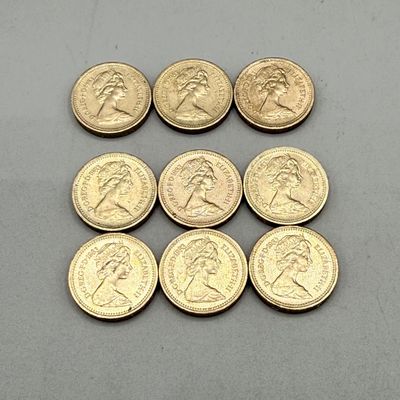 LOT 39: 1983 British Pound Coins (9) - Six with Upside Down Writing on Side Error