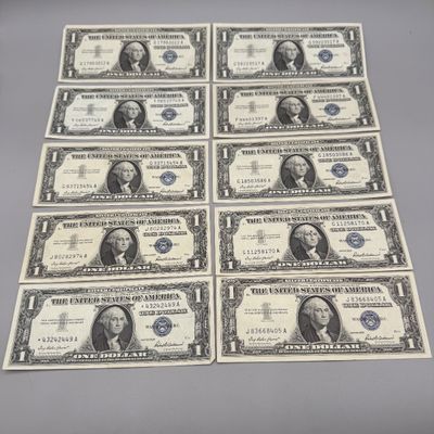 LOT 29: One Dollar Silver Certificates (10) Series 1957