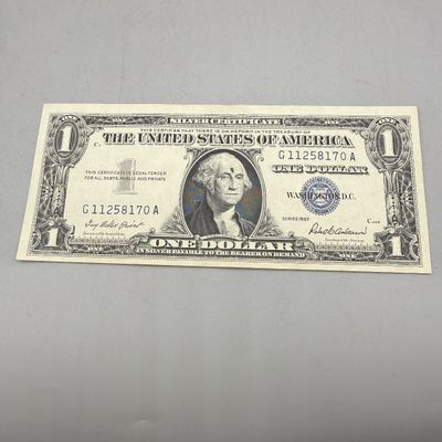 LOT 29: One Dollar Silver Certificates (10) Series 1957