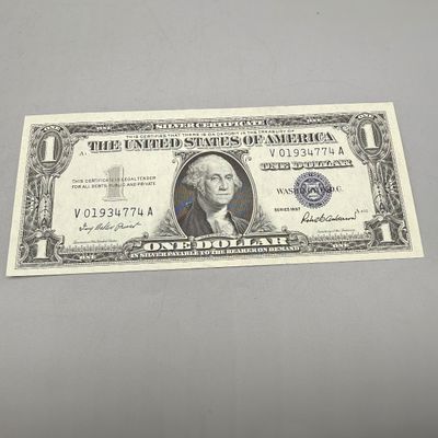 LOT 24: One Dollar Silver Certificates (10) Series 1957
