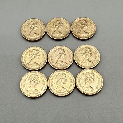 LOT 39: 1983 British Pound Coins (9) - Six with Upside Down Writing on Side Error