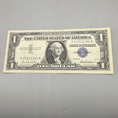 LOT 27: One Dollar Silver Certificates (9) Series 1957, 1957 B, 1935, 1935 G