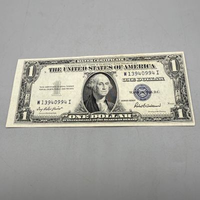 LOT 27: One Dollar Silver Certificates (9) Series 1957, 1957 B, 1935, 1935 G