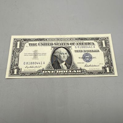 LOT 24: One Dollar Silver Certificates (10) Series 1957