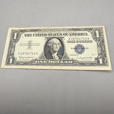LOT 27: One Dollar Silver Certificates (9) Series 1957, 1957 B, 1935, 1935 G