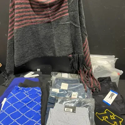 Woman’s Jeans, Pants, Skirts, Yogi, Poncho & More Mystery Lot (Many Unopened)