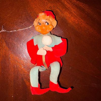 Sale Photo Thumbnail #190: Cheeky Red & Green Christmas Elf, Pixie, Gnome
Shows signs of wear and fading.