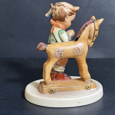 LOT 109: Set of 3 Goebel Hummel Figures - Pray Before Battle, Angel with Lantern, and Good Friends Girl with Lamb