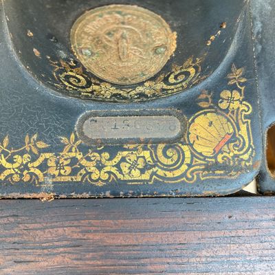 LOT 60: Vintage / Antique Rolling Singer Sewing Machine Cabinet with Wrought Iron Base