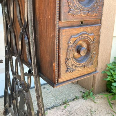 LOT 60: Vintage / Antique Rolling Singer Sewing Machine Cabinet with Wrought Iron Base