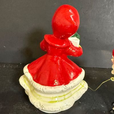 LOT 113: Vintage Kreisler Christmas Shopper with Reindeer and Napco Kissing Angel Shaker
