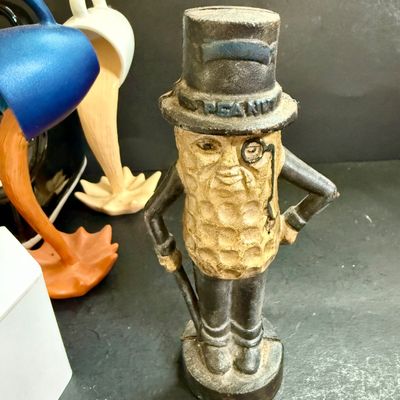 LOT 124: Mr Peanut Cast Iron Bank, ERTL Maytag Ringer Washing Machine Model, Mini Radio, Typewriter Teapot and More