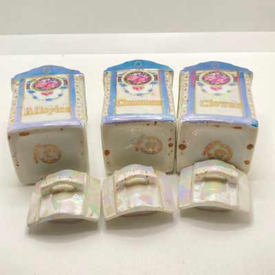 LOT 108: Six Vintage Mepoco Ware Made in Germany Lustreware Canisters / Spice Jars