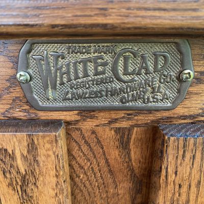 LOT 99: Lawless Hardware Co. White Clad Wooden Cabinet