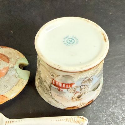 LOT 125: Collection of Painted Nippon Porcelain- Creamers, Pitcher, Plates and More