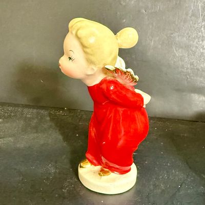 LOT 113: Vintage Kreisler Christmas Shopper with Reindeer and Napco Kissing Angel Shaker