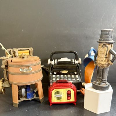LOT 124: Mr Peanut Cast Iron Bank, ERTL Maytag Ringer Washing Machine Model, Mini Radio, Typewriter Teapot and More