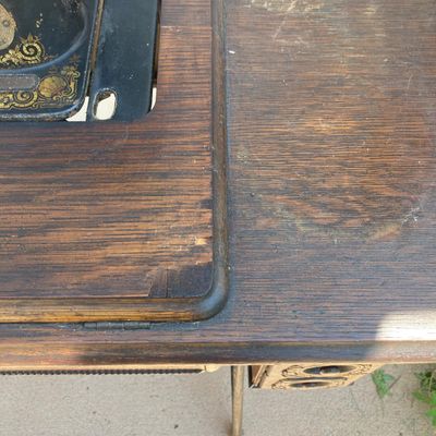 LOT 60: Vintage / Antique Rolling Singer Sewing Machine Cabinet with Wrought Iron Base