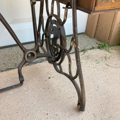 LOT 60: Vintage / Antique Rolling Singer Sewing Machine Cabinet with Wrought Iron Base