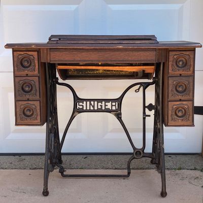 LOT 60: Vintage / Antique Rolling Singer Sewing Machine Cabinet with Wrought Iron Base
