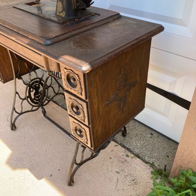 LOT 60: Vintage / Antique Rolling Singer Sewing Machine Cabinet with Wrought Iron Base