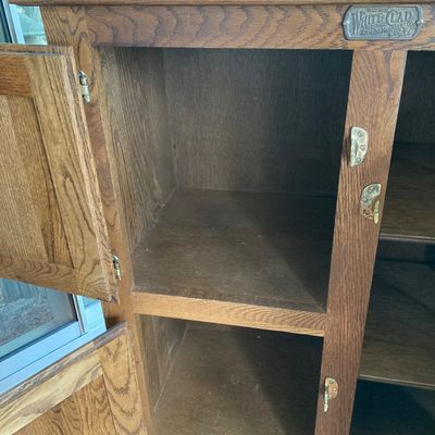 LOT 99: Lawless Hardware Co. White Clad Wooden Cabinet