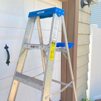 LOT 56: Pair of Werner Aluminum Step Ladders - 4 Foot and 6 Foot