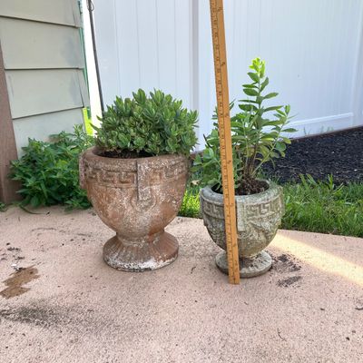 LOT 75: Pair of Greek Key Style Concrete Planters with Plants and Floral Spinner