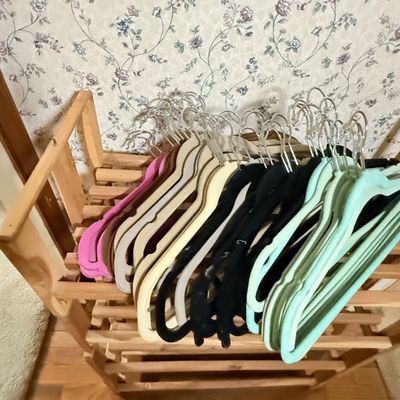 LOT 119: Set of 4 Stackable Cedar Shoe Racks and a Group of Cloth Hanger