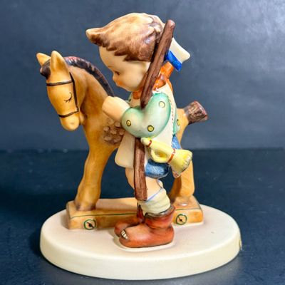 LOT 109: Set of 3 Goebel Hummel Figures - Pray Before Battle, Angel with Lantern, and Good Friends Girl with Lamb